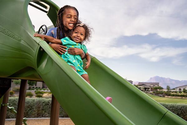 Kids in neighborhood park at Blossom Rock in Mesa, Arizona