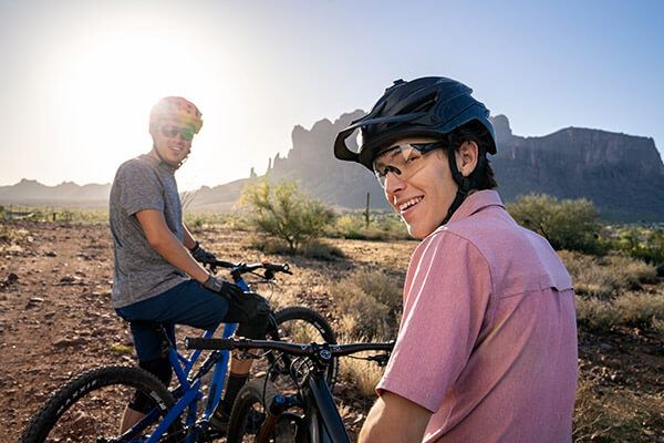 Bikers in Superstition Mountains near Blossom Rock Mesa, Arizona
